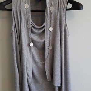 Maternity sleeveless top with attached vest